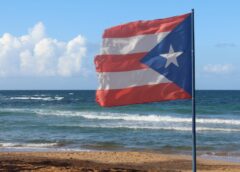 A Puerto Rican flag on the beach