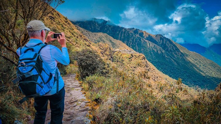 capturing the andes reflection and awe on the trail inkayni peru tours