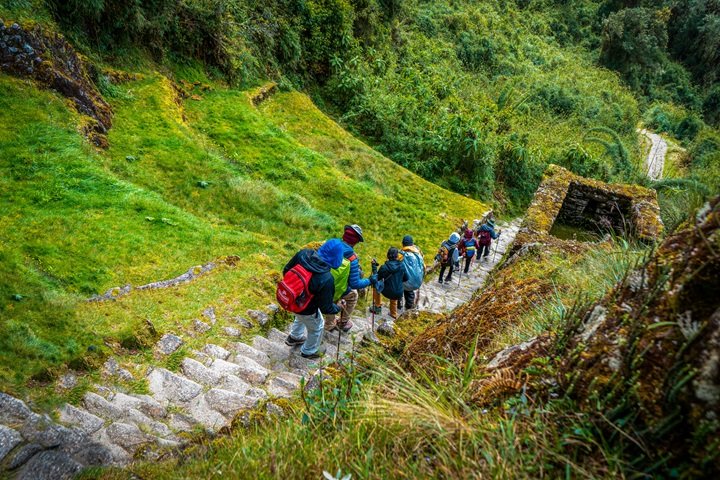 descending ancient inca steps at intipata terraced slopes and hidden ruins inkayni peru tours